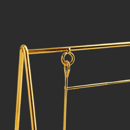 Dual-Tone Equilibrium Swing: Gold & Silver Bear Metal Décor